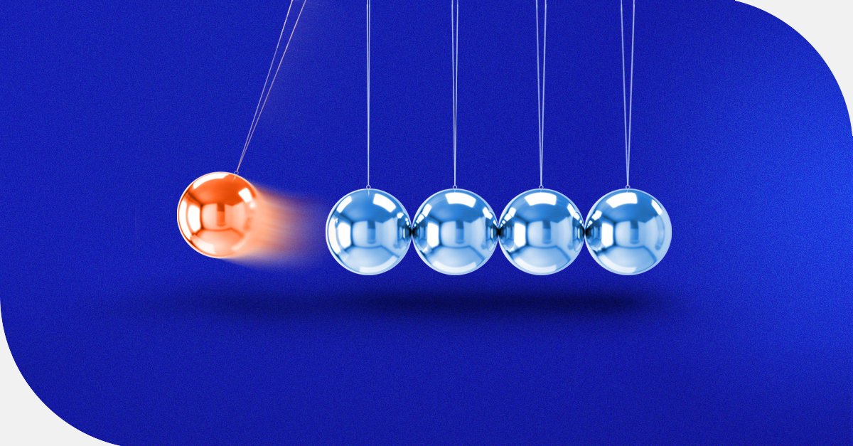 Newton's cradle with one orange ball striking four blue balls